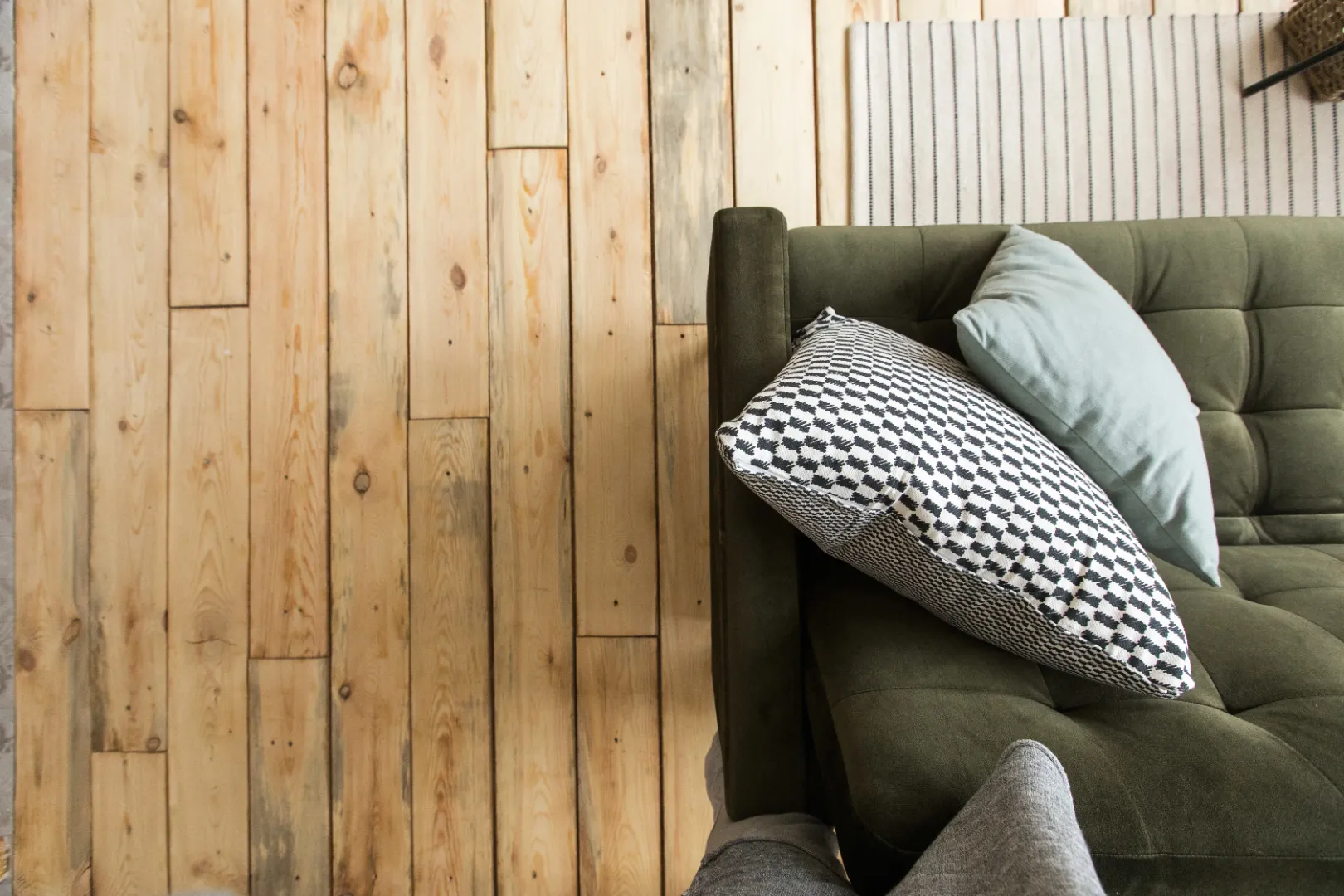 Pressure-treated wood decking with natural wood boards and outdoor seating